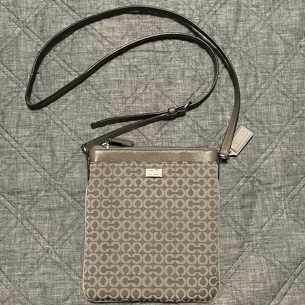 Coach Crossbody, Grey fabric with leather strap.